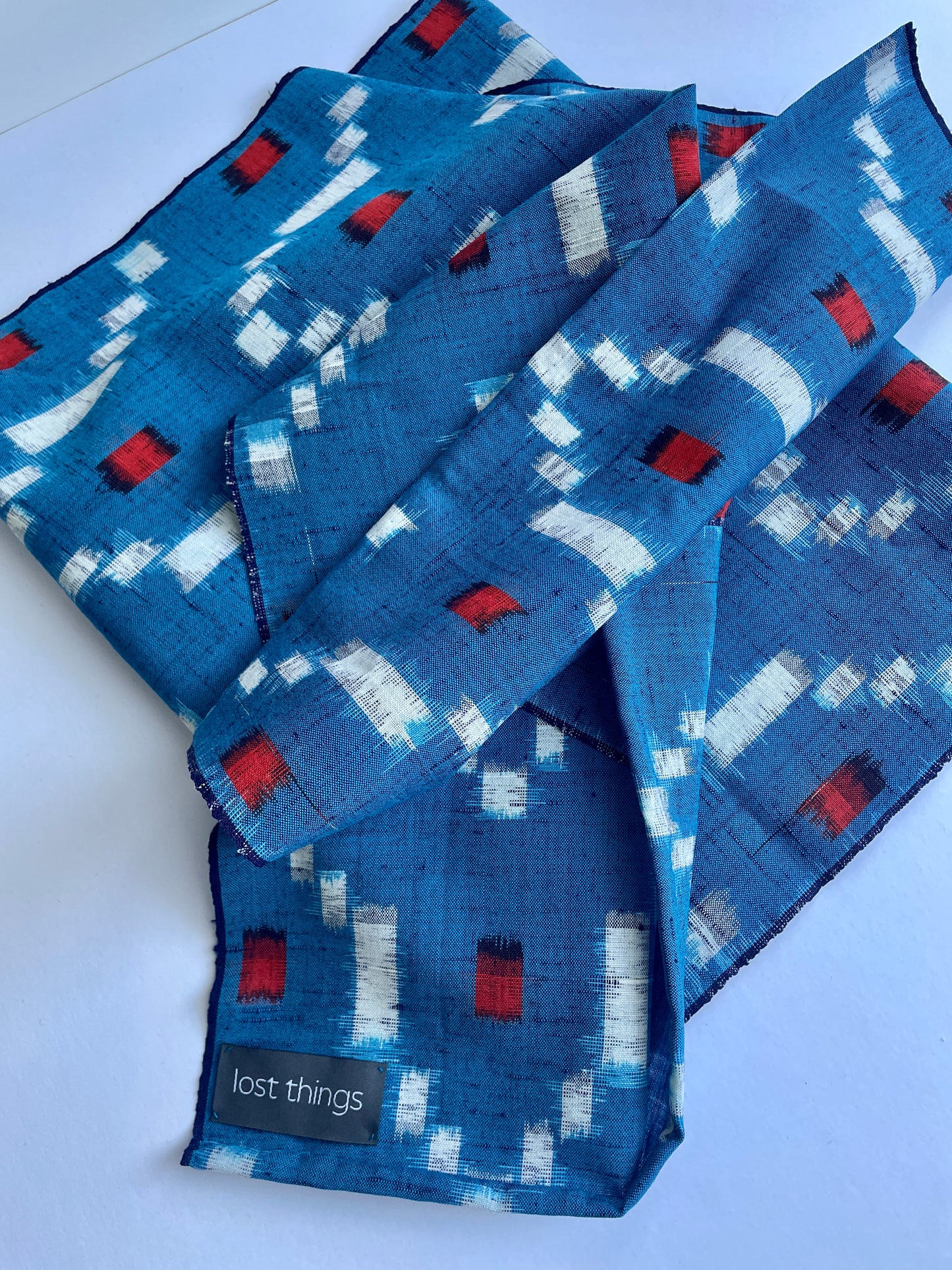Antique Japanese Kusakizome Fabric Scarf&nbsp;

This long, medium weight, brightly patterned linen and wool scarf, has been made from antique Japanese woven Kusakizome fabric, which was originally used for making kimonos. The blue colour is a mixture of two indigo dyes and the beautiful red colour was produced by eco friendly botanical dying known as Kusakizome. The ends have been hand hemmed.