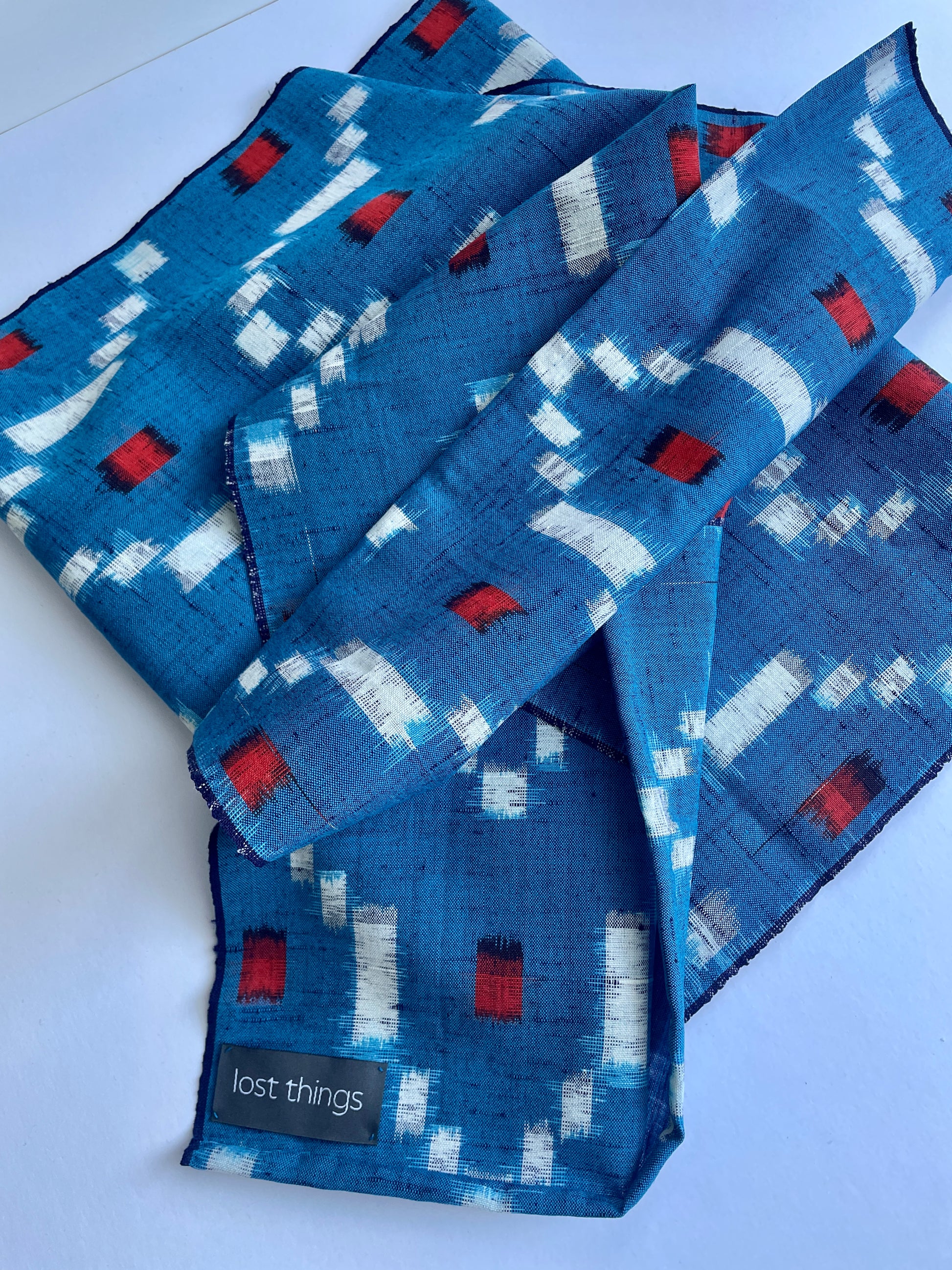 Antique Japanese Kusakizome Fabric Scarf&nbsp;

This long, medium weight, brightly patterned linen and wool scarf, has been made from antique Japanese woven Kusakizome fabric, which was originally used for making kimonos. The blue colour is a mixture of two indigo dyes and the beautiful red colour was produced by eco friendly botanical dying known as Kusakizome. The ends have been hand hemmed.