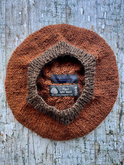 Hand Knitted Wool Beret Paprika + Dark Chocolate

Beautifully hand knitted beret in Icelandic pure wool, perfect for keeping your head warm on cold days, knitted in vibrant paprika colour, with a dark chocolate pom and ribbed band that gives the hat a snug fit.

SIZE: adult.

DIAMETER: 11" / 28cm.

CARE: hand wash or machine wash on wool cycle at 30 degrees, dry flat, do not tumble dry.