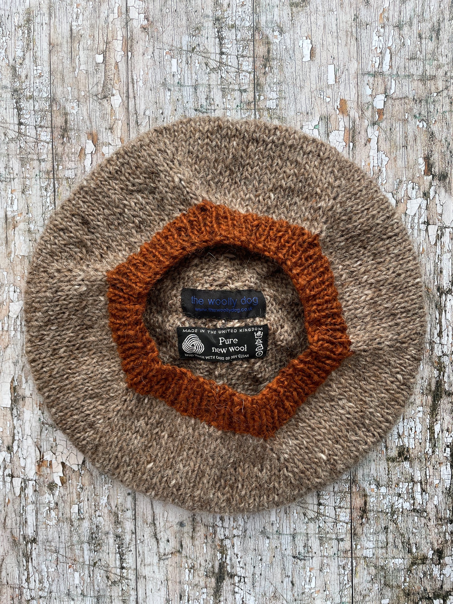 Hand Knitted Wool Beret Dark Oat + Paprika

Beautifully hand knitted beret in Icelandic pure wool, perfect for keeping your head warm on cold days, knitted in dark oat with a vibrant paprika pom and ribbed band that gives the hat a snug fit.

SIZE: adult.

DIAMETER: 11+1/2" / 29cm.

CARE: hand wash or machine wash on wool cycle at 30 degrees, dry flat, do not tumble dry.