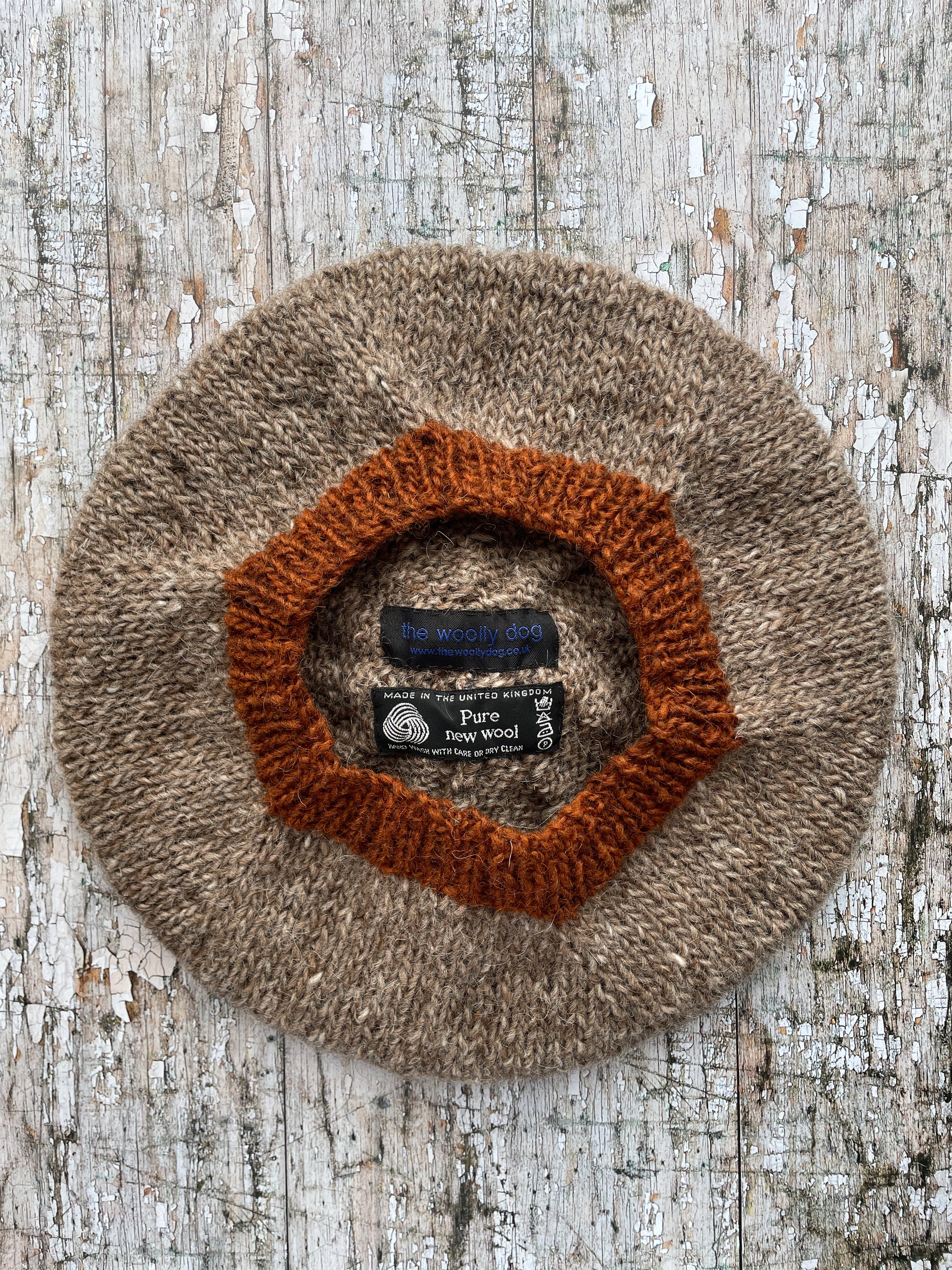 Hand Knitted Wool Beret Dark Oat + Paprika

Beautifully hand knitted beret in Icelandic pure wool, perfect for keeping your head warm on cold days, knitted in dark oat with a vibrant paprika pom and ribbed band that gives the hat a snug fit.

SIZE: adult.

DIAMETER: 11+1/2" / 29cm.

CARE: hand wash or machine wash on wool cycle at 30 degrees, dry flat, do not tumble dry.