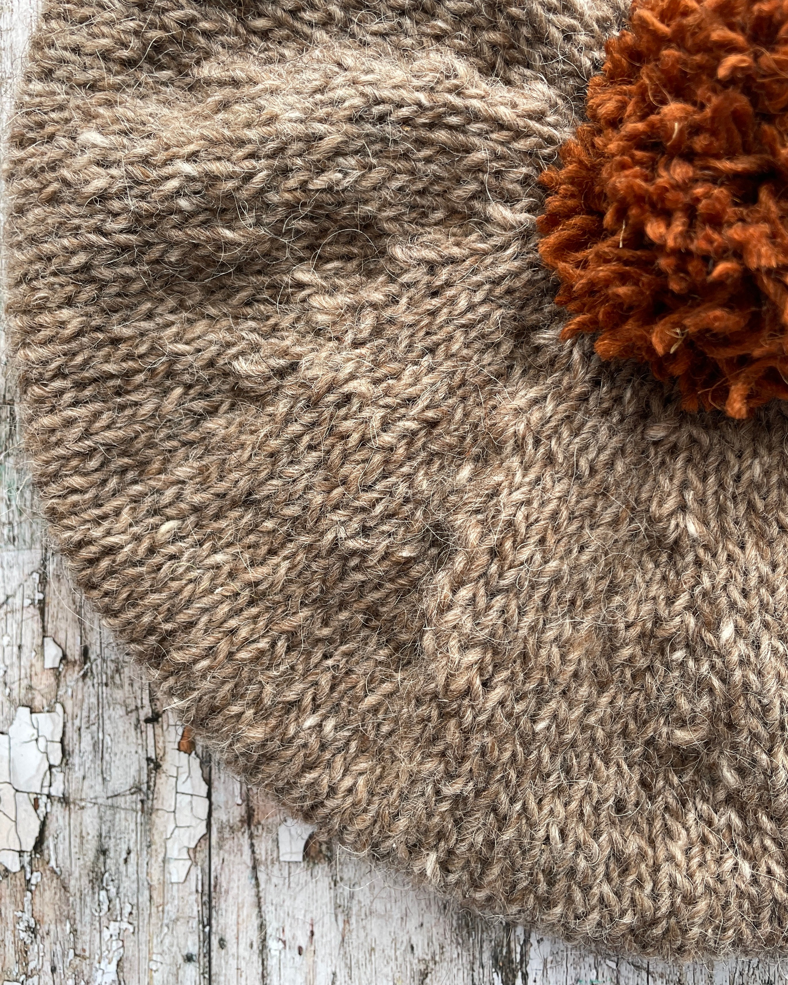 Hand Knitted Wool Beret Dark Oat + Paprika

Beautifully hand knitted beret in Icelandic pure wool, perfect for keeping your head warm on cold days, knitted in dark oat with a vibrant paprika pom and ribbed band that gives the hat a snug fit.

SIZE: adult.

DIAMETER: 11+1/2" / 29cm.

CARE: hand wash or machine wash on wool cycle at 30 degrees, dry flat, do not tumble dry.