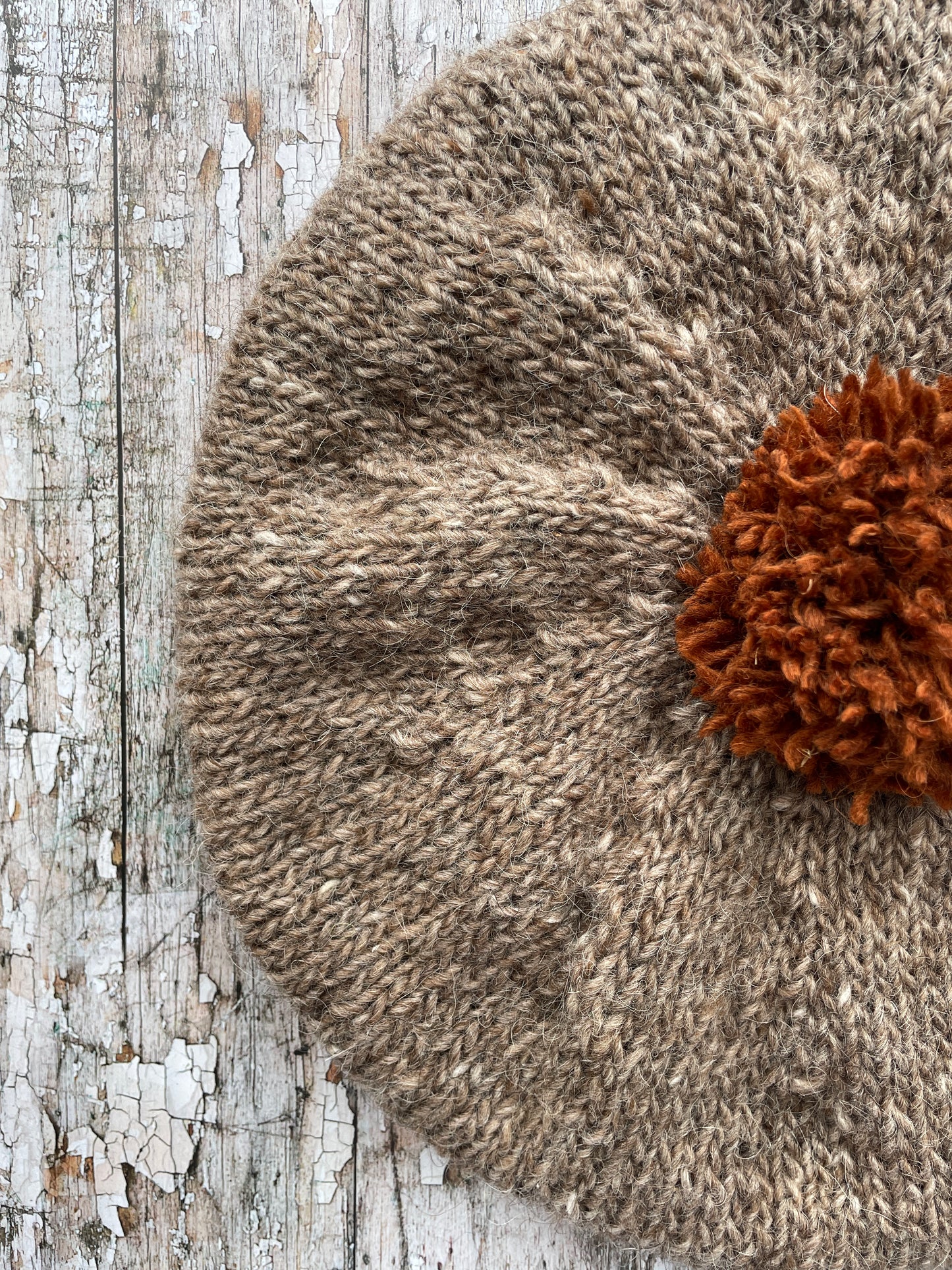 Hand Knitted Wool Beret Dark Oat + Paprika

Beautifully hand knitted beret in Icelandic pure wool, perfect for keeping your head warm on cold days, knitted in dark oat with a vibrant paprika pom and ribbed band that gives the hat a snug fit.

SIZE: adult.

DIAMETER: 11+1/2" / 29cm.

CARE: hand wash or machine wash on wool cycle at 30 degrees, dry flat, do not tumble dry.