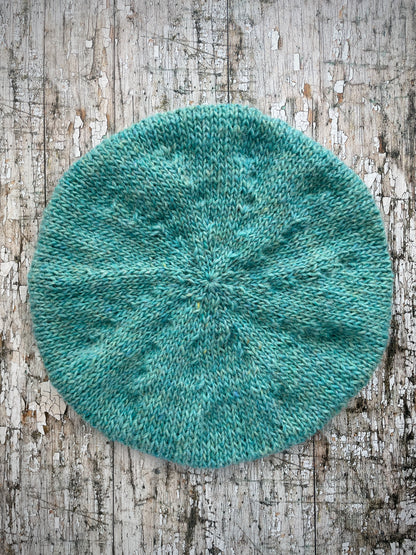 Hand Knitted Wool Beret Aqua Heather

Beautifully hand knitted beret in Icelandic pure wool, perfect for keeping your head warm on cold days and knitted in a lovely aquamarine colour, with a ribbed band that gives the hat a snug fit.

SIZE: adult.

DIAMETER: 11+1/4" / 28.5cm.

CARE: hand wash or machine wash on wool cycle at 30 degrees, dry flat, do not tumble dry.