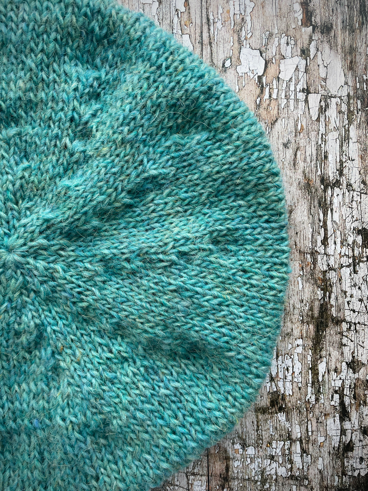Hand Knitted Wool Beret Aqua Heather

Beautifully hand knitted beret in Icelandic pure wool, perfect for keeping your head warm on cold days and knitted in a lovely aquamarine colour, with a ribbed band that gives the hat a snug fit.

SIZE: adult.

DIAMETER: 11+1/4" / 28.5cm.

CARE: hand wash or machine wash on wool cycle at 30 degrees, dry flat, do not tumble dry.