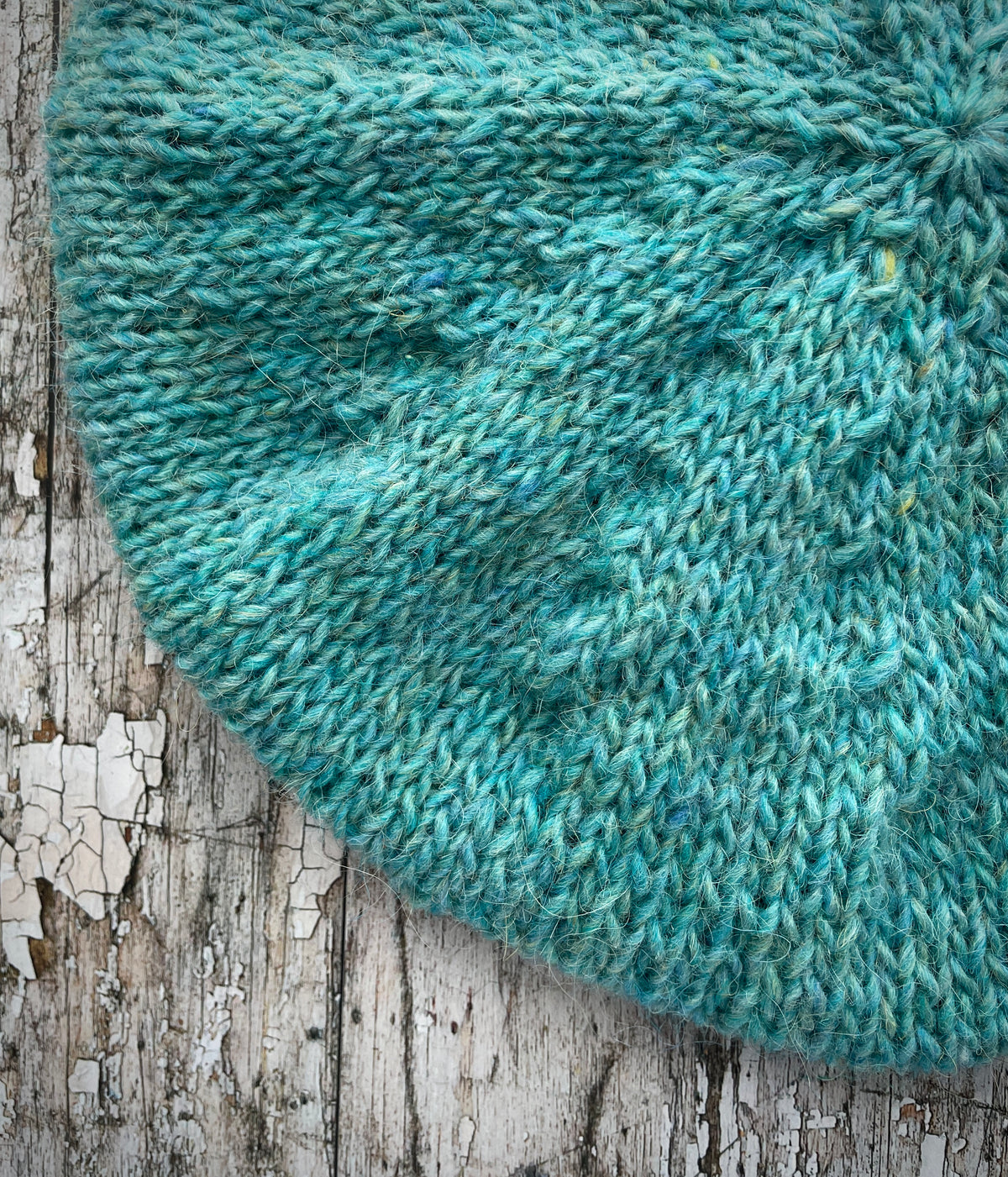 Hand Knitted Wool Beret Aqua Heather

Beautifully hand knitted beret in Icelandic pure wool, perfect for keeping your head warm on cold days and knitted in a lovely aquamarine colour, with a ribbed band that gives the hat a snug fit.

SIZE: adult.

DIAMETER: 11+1/4" / 28.5cm.

CARE: hand wash or machine wash on wool cycle at 30 degrees, dry flat, do not tumble dry.