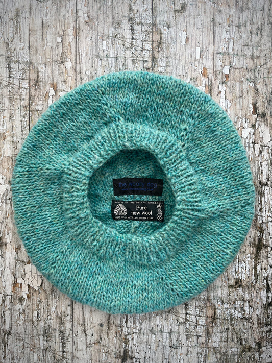 Hand Knitted Wool Beret Aqua Heather

Beautifully hand knitted beret in Icelandic pure wool, perfect for keeping your head warm on cold days and knitted in a lovely aquamarine colour, with a ribbed band that gives the hat a snug fit.

SIZE: adult.

DIAMETER: 11+1/4" / 28.5cm.

CARE: hand wash or machine wash on wool cycle at 30 degrees, dry flat, do not tumble dry.