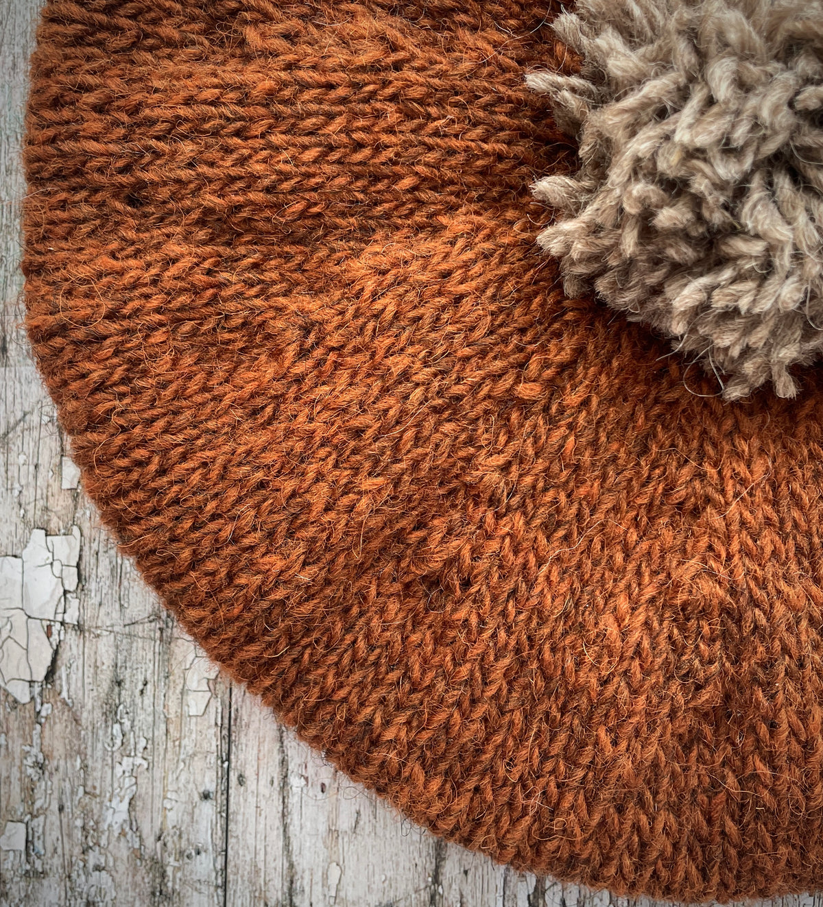 Hand Knitted Wool Beret Paprika + Dark Oat

Beautifully hand knitted beret in Icelandic pure wool, perfect for keeping your head warm on cold days, knitted in paprika with a dark oat colour pom and ribbed band that gives the hat a snug fit.

SIZE: adult.

DIAMETER: 11+1/4" / 28.5 cm.

CARE: hand wash or machine wash on wool cycle at 30 degrees, dry flat, do not tumble dry.