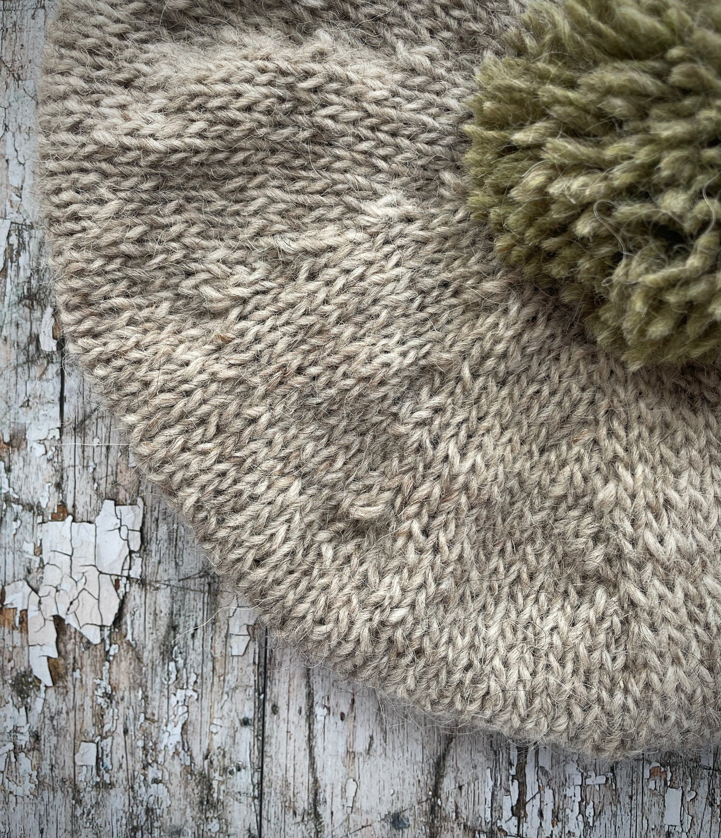 Hand Knitted Wool Beret Oat + Frosted Grass

Beautifully hand knitted beret in Icelandic pure wool, perfect for keeping your head warm on cold days, knitted in oat with a frosted grass colour pom and ribbed band that gives the hat a snug fit.

SIZE: adult.

DIAMETER: 11+1/4" / 29cm.

CARE: hand wash or machine wash on wool cycle at 30 degrees, dry flat, do not tumble dry.