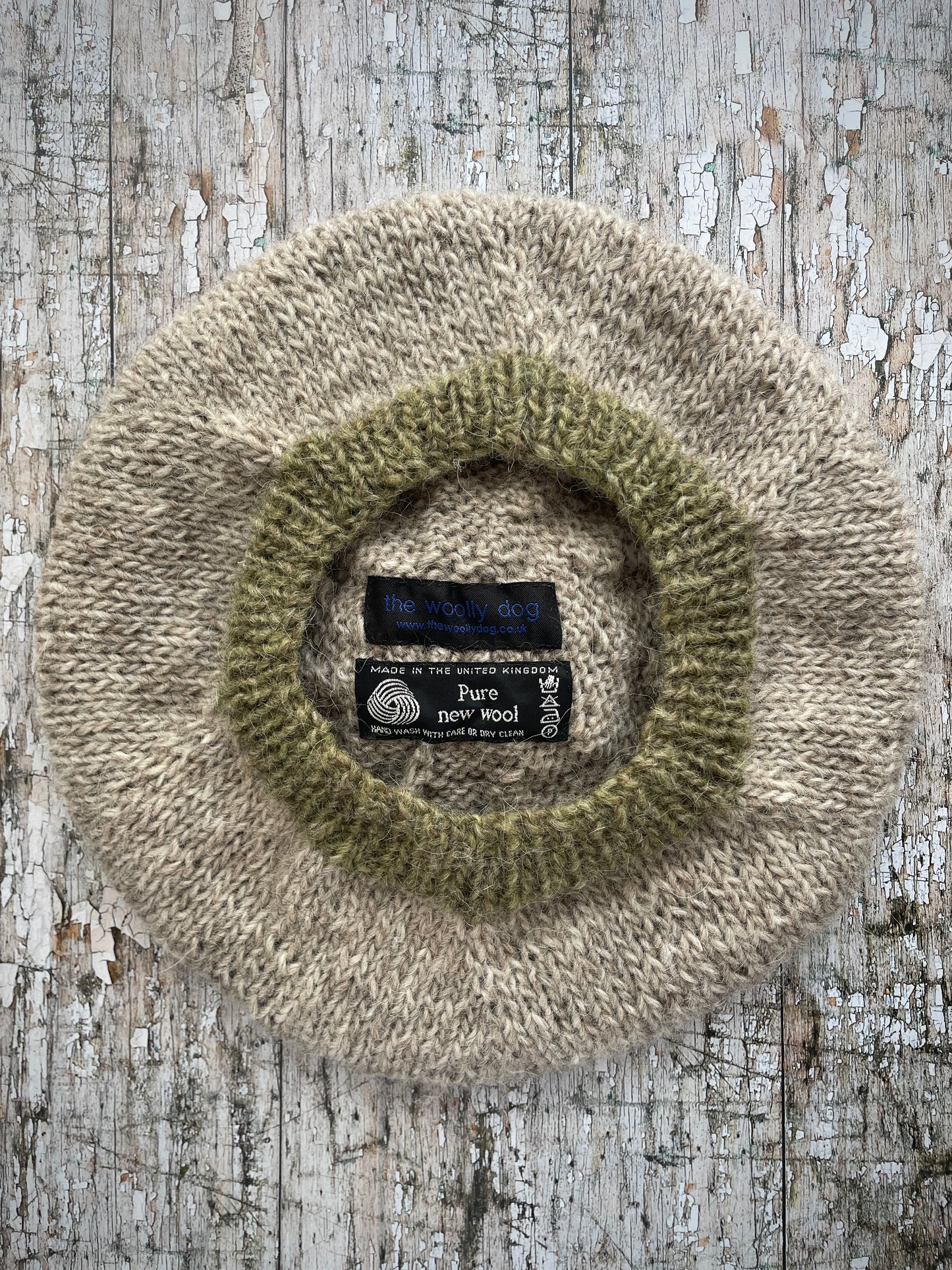 Hand Knitted Wool Beret Oat + Frosted Grass

Beautifully hand knitted beret in Icelandic pure wool, perfect for keeping your head warm on cold days, knitted in oat with a frosted grass colour pom and ribbed band that gives the hat a snug fit.

SIZE: adult.

DIAMETER: 11+1/4" / 29cm.

CARE: hand wash or machine wash on wool cycle at 30 degrees, dry flat, do not tumble dry.