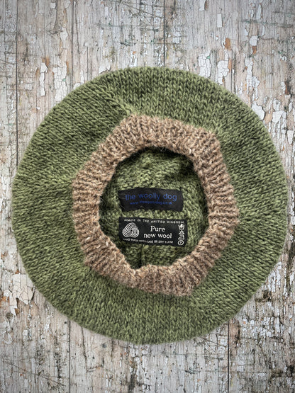 Hand Knitted Wool Beret Olive + Dark Oat

Beautifully hand knitted beret in Icelandic pure wool, perfect for keeping your head warm on cold days, knitted in olive with a dark oat colour pom and ribbed band that gives the hat a snug fit.

SIZE: adult.

DIAMETER: 11" / 28 cm.

CARE: hand wash or machine wash on wool cycle at 30 degrees, dry flat, do not tumble dry.