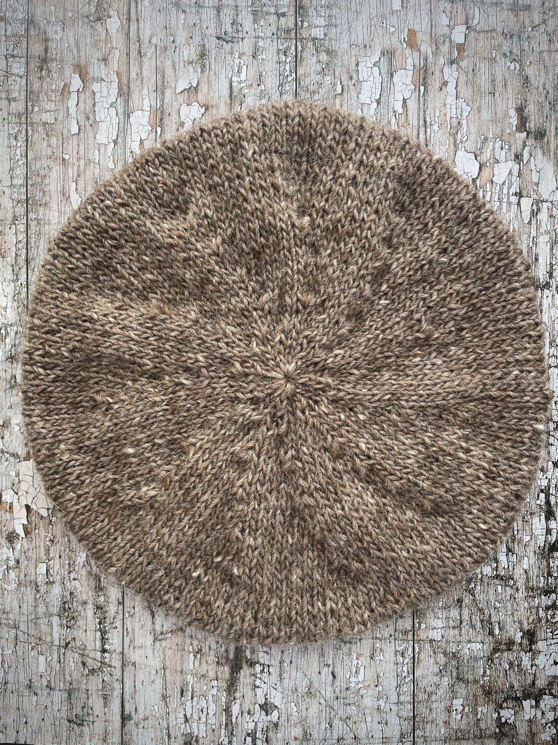 Hand Knitted Wool Beret Dark Oat + Dark Chocolate

Beautifully hand knitted beret in Icelandic pure wool, perfect for keeping your head warm on cold days, knitted in dark oat heather, with a dark chocolate brown ribbed band that gives the hat a snug fit.

SIZE: adult.

DIAMETER: 11+1/4" / 28.5 cm.

CARE: hand wash or machine wash on wool cycle at 30 degrees, dry flat, do not tumble dry.