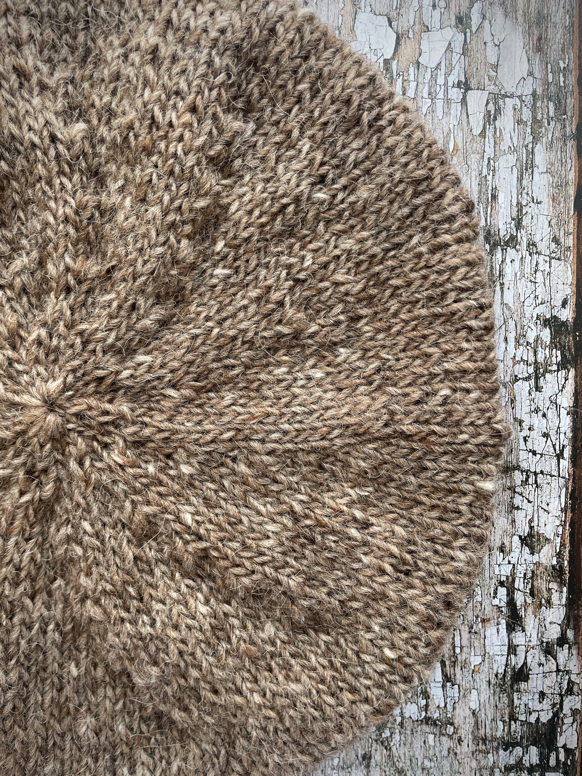 Hand Knitted Wool Beret Dark Oat + Dark Chocolate

Beautifully hand knitted beret in Icelandic pure wool, perfect for keeping your head warm on cold days, knitted in dark oat heather, with a dark chocolate brown ribbed band that gives the hat a snug fit.

SIZE: adult.

DIAMETER: 11+1/4" / 28.5 cm.

CARE: hand wash or machine wash on wool cycle at 30 degrees, dry flat, do not tumble dry.