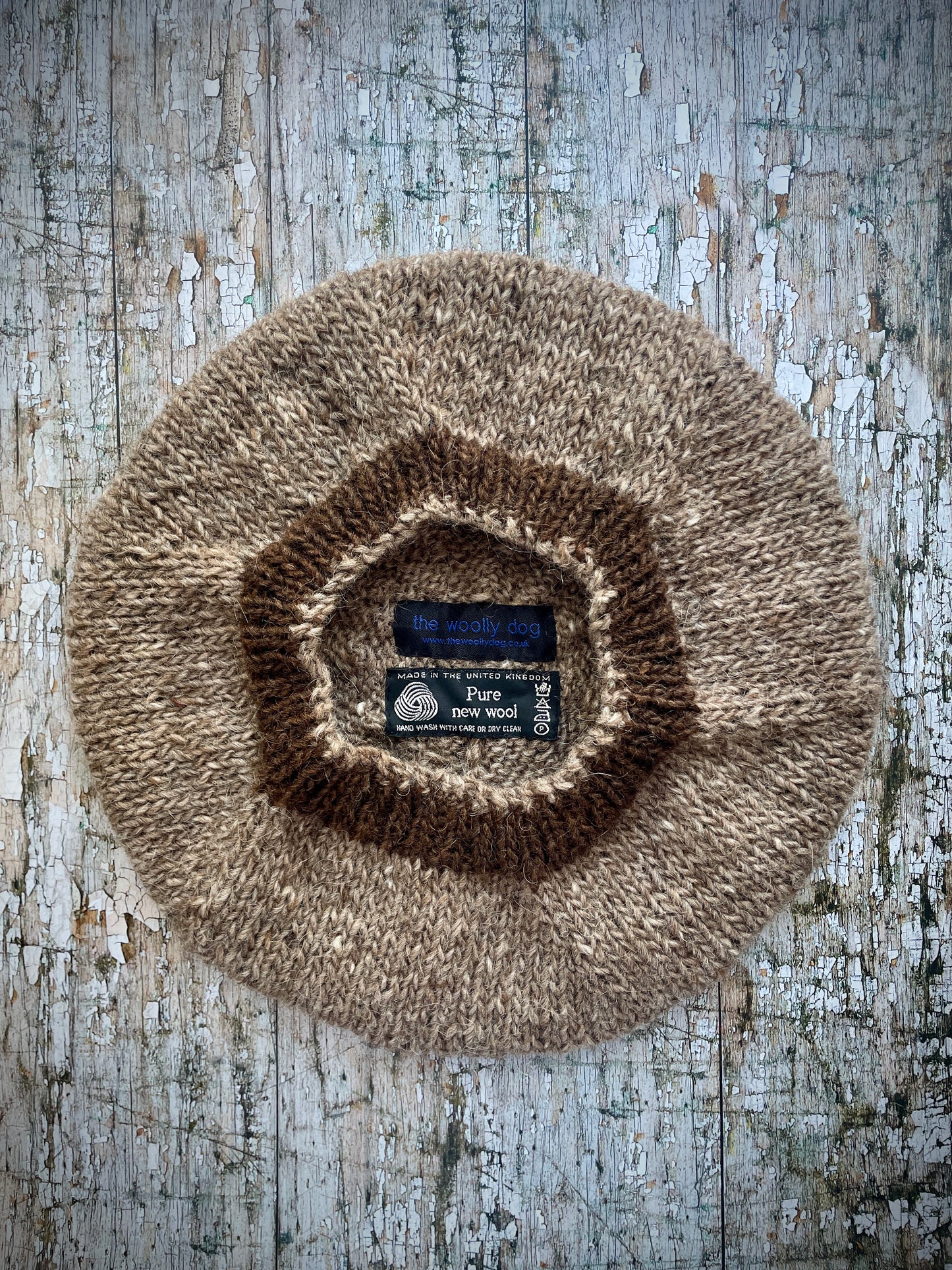 Hand Knitted Wool Beret Dark Oat + Dark Chocolate

Beautifully hand knitted beret in Icelandic pure wool, perfect for keeping your head warm on cold days, knitted in dark oat heather, with a dark chocolate brown ribbed band that gives the hat a snug fit.

SIZE: adult.

DIAMETER: 11+1/4" / 28.5 cm.

CARE: hand wash or machine wash on wool cycle at 30 degrees, dry flat, do not tumble dry.