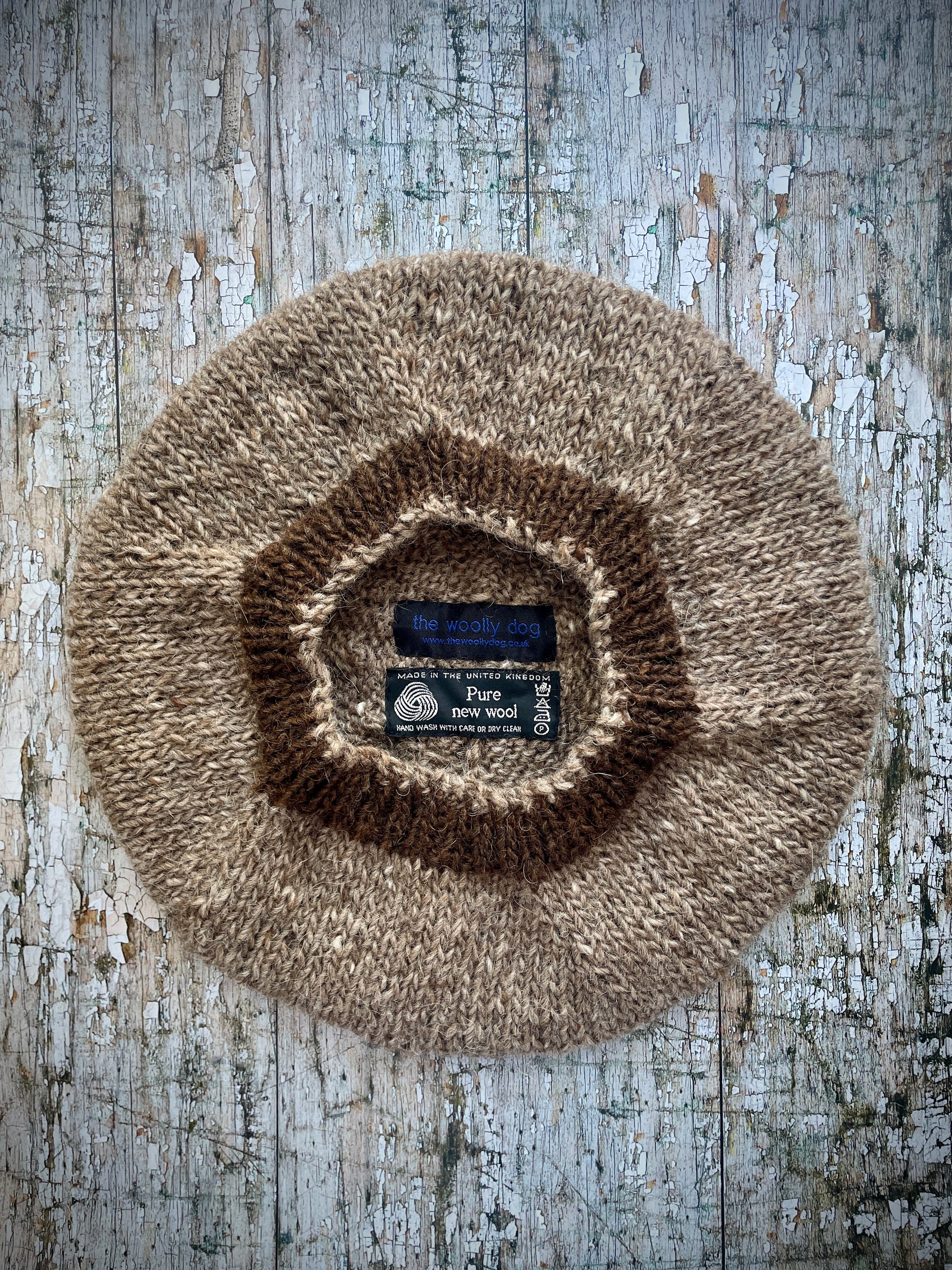 Hand Knitted Wool Beret Dark Oat + Dark Chocolate

Beautifully hand knitted beret in Icelandic pure wool, perfect for keeping your head warm on cold days, knitted in dark oat heather, with a dark chocolate brown ribbed band that gives the hat a snug fit.

SIZE: adult.

DIAMETER: 11+1/4" / 28.5 cm.

CARE: hand wash or machine wash on wool cycle at 30 degrees, dry flat, do not tumble dry.