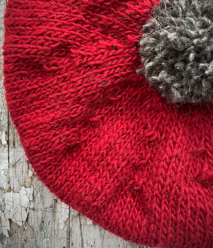 Hand Knitted Wool Beret Red + Grey Tweed

Beautifully hand knitted beret in Icelandic pure wool, perfect for keeping your head warm on cold days. Knitted in red with a grey pom and grey ribbed band that gives the hat a snug fit.

SIZE: adult.

CARE: hand wash or machine wash on wool cycle at 30 degrees, dry flat, do not tumble dry.