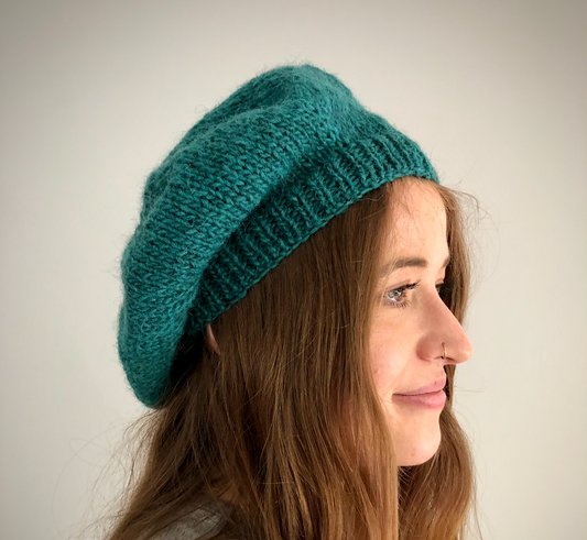 Hand Knitted Wool Beret Viridian

Beautifully hand knitted beret in Icelandic pure wool, perfect for keeping your head warm on cold days and knitted in a lovely viridian colour, with a ribbed band that gives the hat a snug fit.

SIZE: adult.

DIAMETER: 11+3/4" / 29.5cm.

CARE: hand wash or machine wash on wool cycle at 30 degrees, dry flat, do not tumble dry.